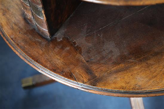 A George III mahogany revolving bookcase, circa 1820, H.4ft Diam.2ft 11in.